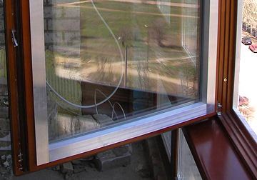 Совершенствование классики или деревоалюминиевые окна для нашего дома